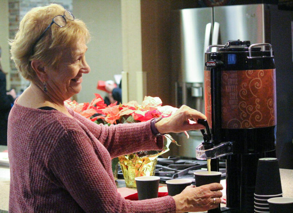 senior living resident getting coffee