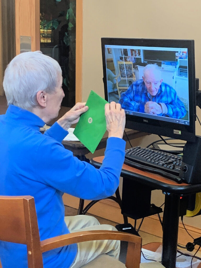 Older adult woman staying connected via video call
